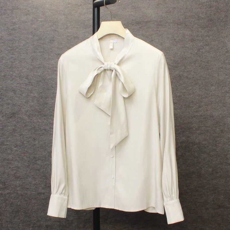 

Весна 2025 Женская блузка с длинным рукавом, бантом из сатина и ярким шелковистым блеском Medium абрикосовый