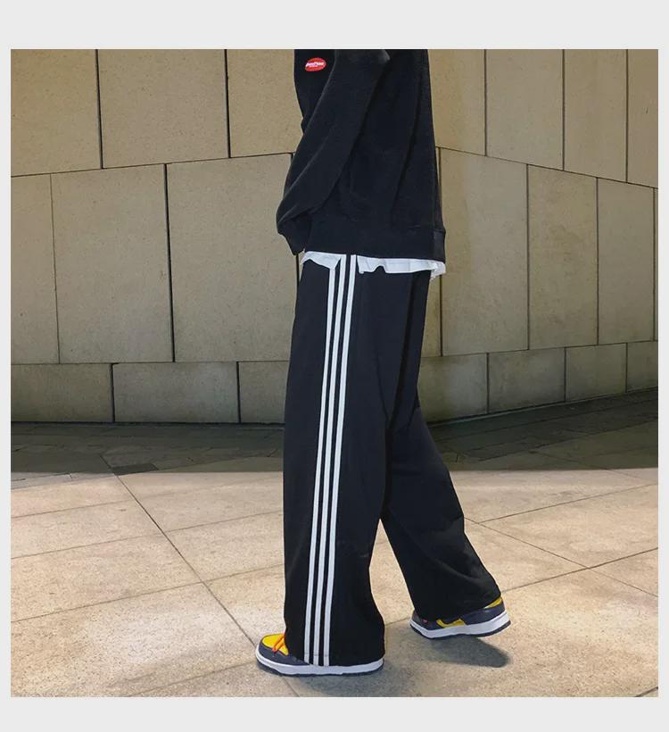 Damskie spodnie sportowe w paski w stylu koreańskim - luźne, sięgające do ziemi, w jednolitym kolorze, na wiosnę i jesień