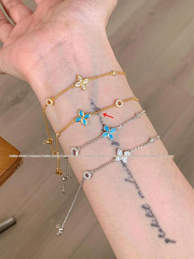 Exquisite Blue Four-Leaf Flower Zircon Bracelet: Versatile, High-Value, Micro-Paved, Stacking Jewelry