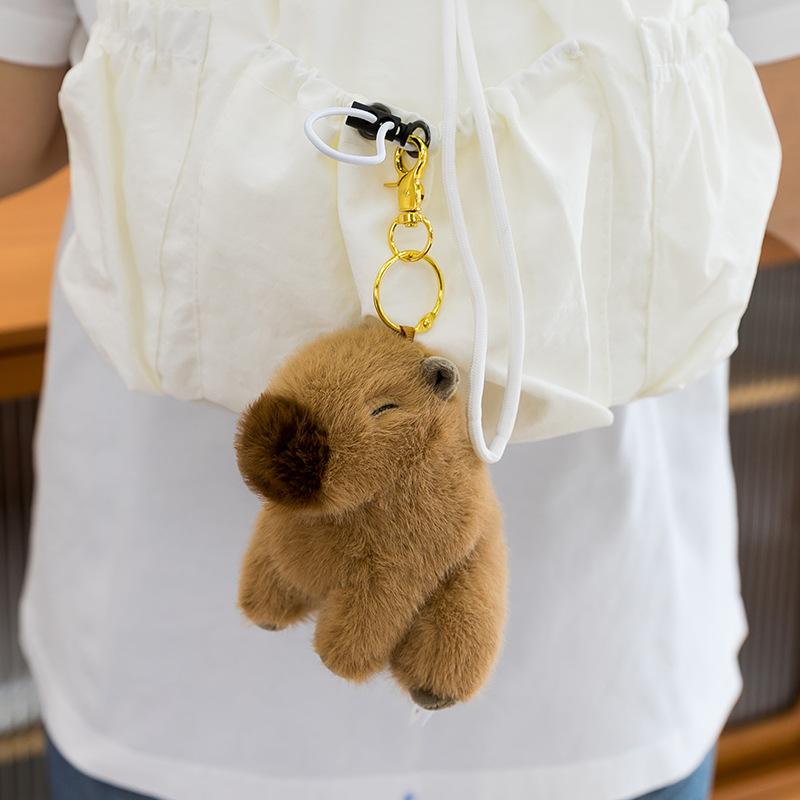 Urocza pluszowa zabawka kapibara symulacyjna poduszka do spania dla dzieci zawieszka do plecaka lalka świnka morska