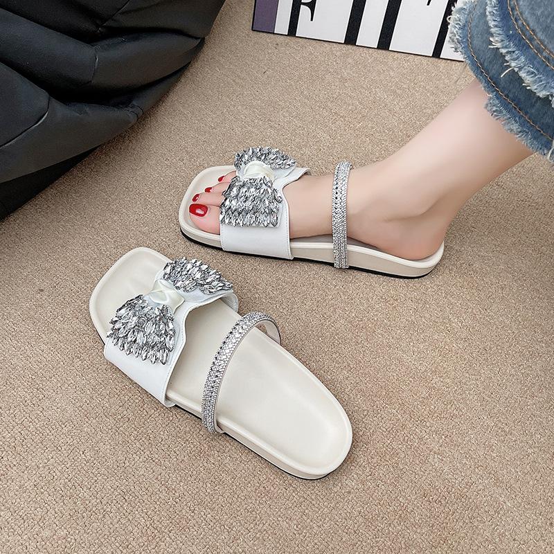 Summer 2025 new thick-bottomed rhinestone bow cool slippers women's summer wear versatile with skirt French flat-bottomed drag