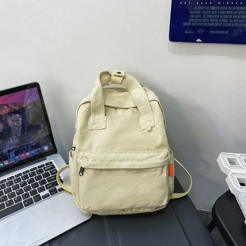 

Japanese washed canvas backpack female simple casual college student schoolbag female Harajufeng high school campus small backpack