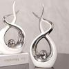 2pcs Set a Pair of Home Decoration Pieces Elegant Decorative Bottles Resin Process Abstract Geometric Design Suitable for Living Room Porch