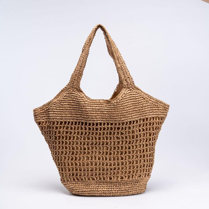New shoulder hollow straw bag women's leisure handheld straw bag handwoven bag seaside vacation beach bag