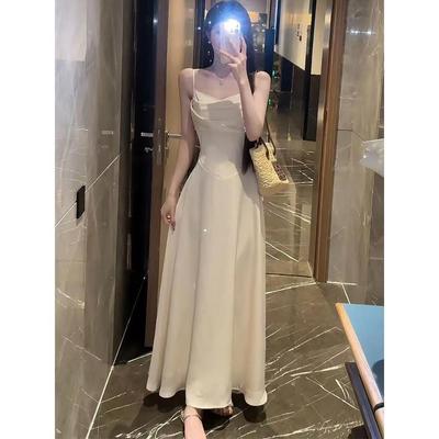 Tempérament col balançoire robe à bretelles femme été décontracté nouveau taille fine jupe