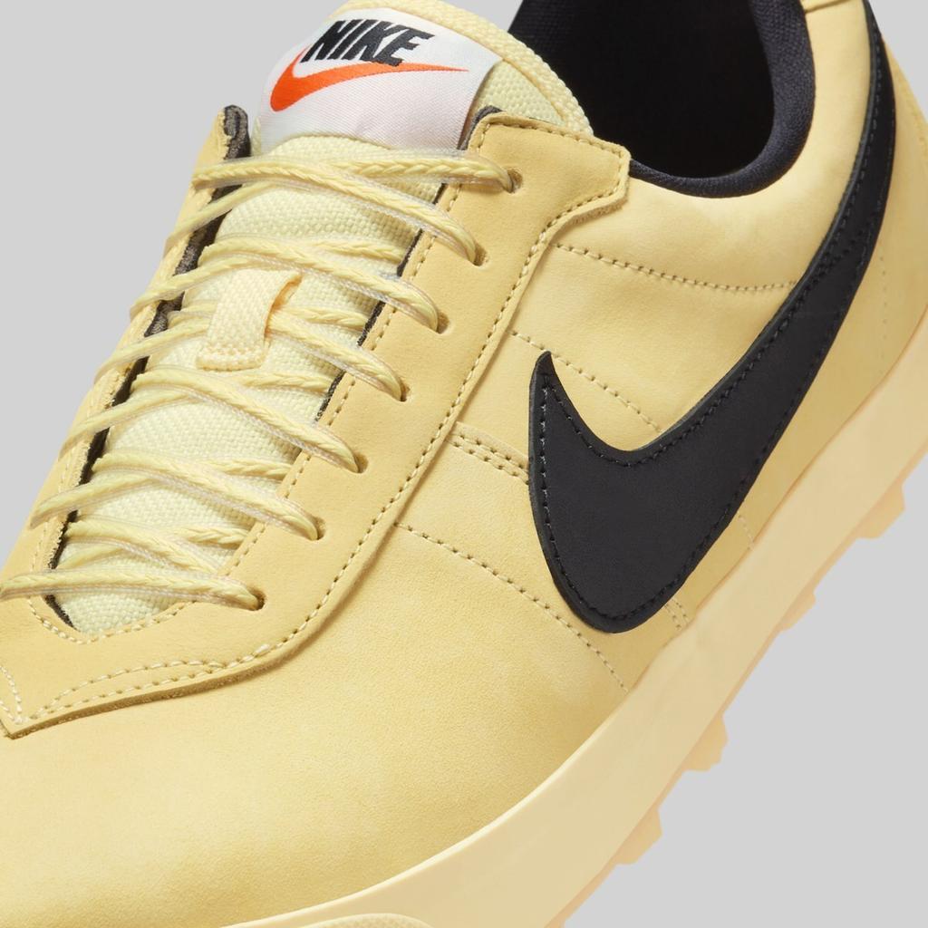 IH2341-700 Nike Astro Grabber Soft Yellow Black (Men's)