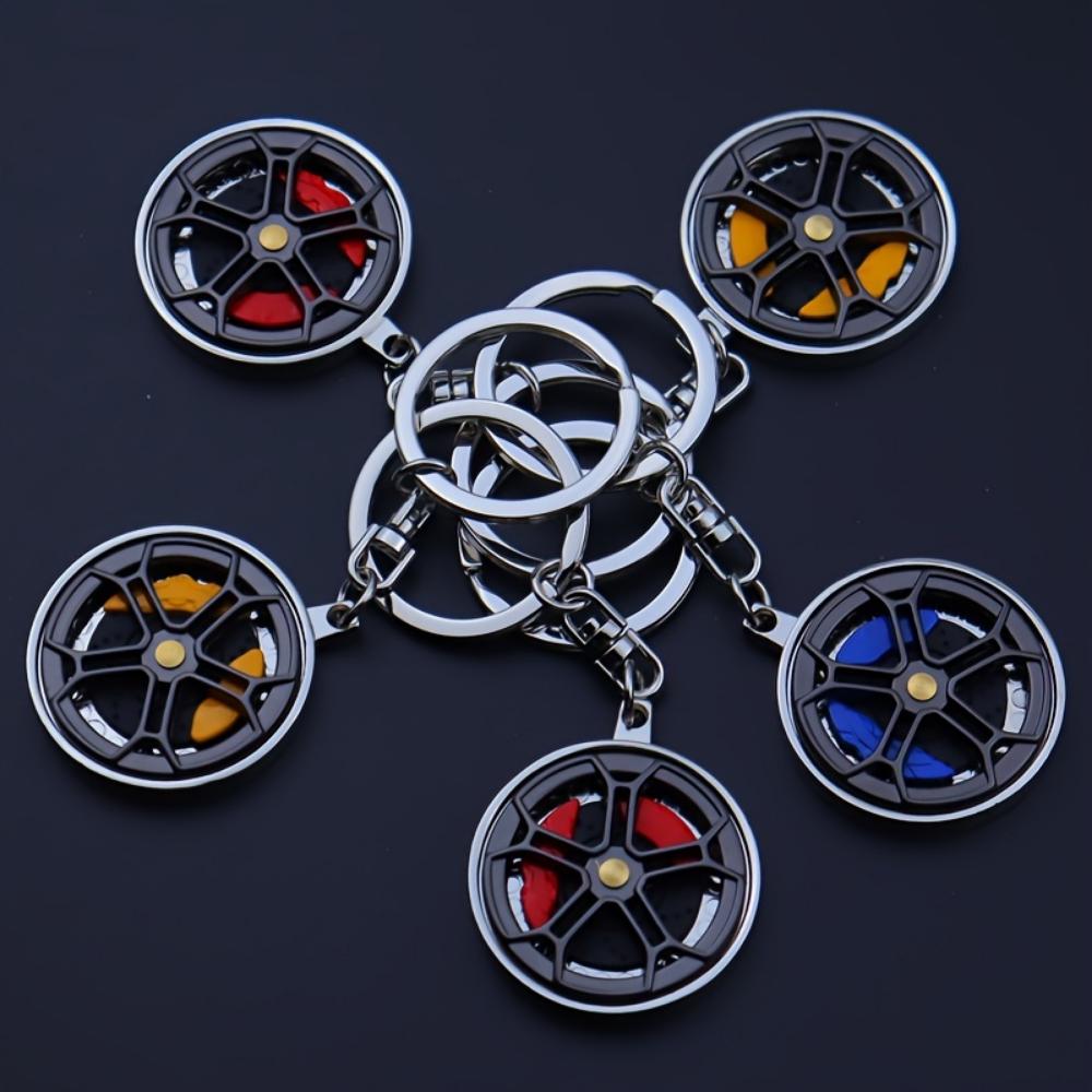 Metallbremsradnabe drehen integrierte Pistole schwarzer Schlüsselanhänger Weihnachtsgeschenk Mercedes-Benz Radnaben-Bremssattel-Schlüsselanhänger