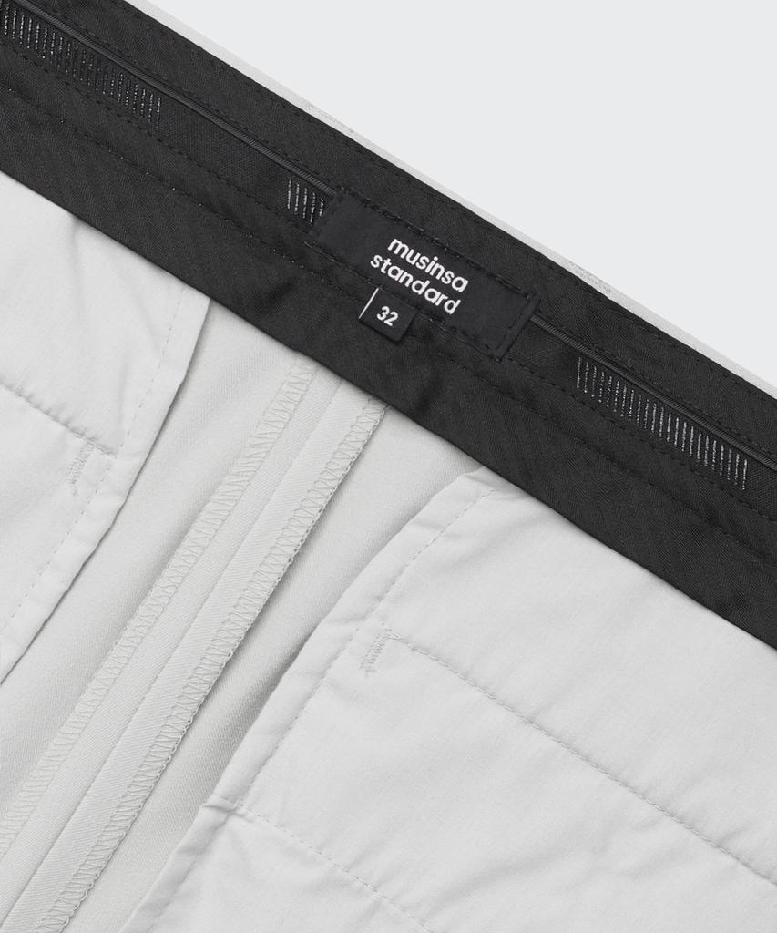 MUSINSA STANDARD Tapered Hidden Banding Crop Slacks [Dusty Cream]