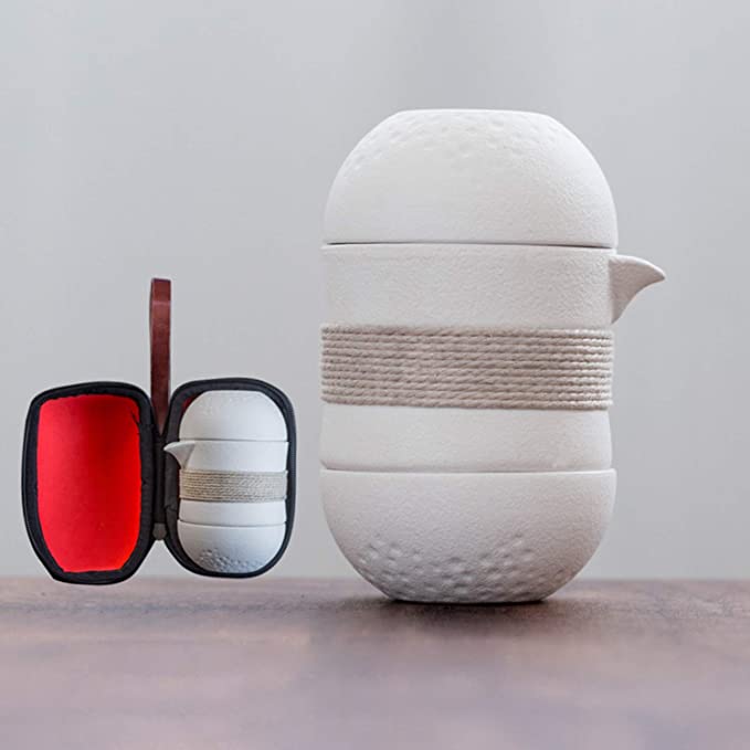 

Керамическая чашка для быстрого чая Один чайник Две чашки Портативная сумка Черная глина Набор для чая Кунг-фу белый