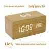 Wireless LED Wooden Alarm Clock with Adjustable Brightness and Digital Display for Bedroom or Study, Includes Wireless Charging.