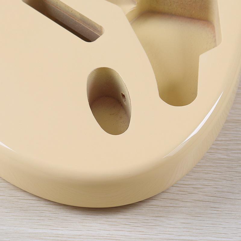 Lesklé krémově žluté tělo elektrické kytary z topolu se třemi single-coil snímači