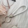 Gevlochten Lederen Touw Sleutelhanger met Poppenhanger - Modieus en Creatief Accessoire