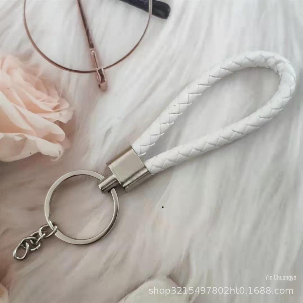 Gevlochten Lederen Touw Sleutelhanger met Poppenhanger - Modieus en Creatief Accessoire