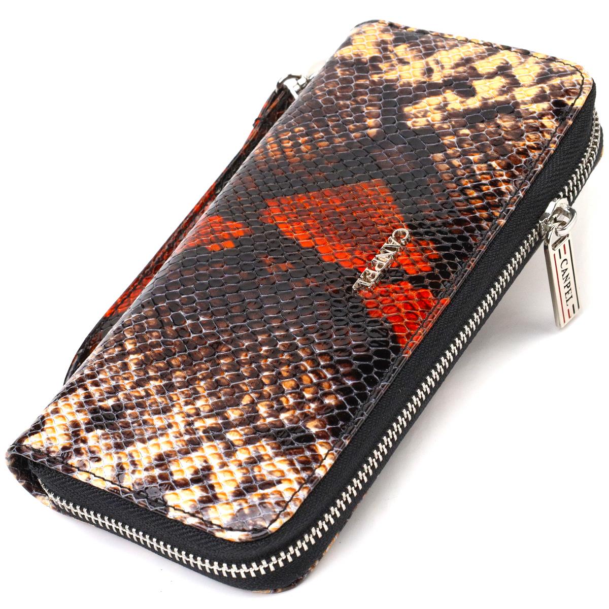

Оригінальний гаманець для жінок з натуральної фактурної шкіри з тисненням під змію CANPELLINI 21722