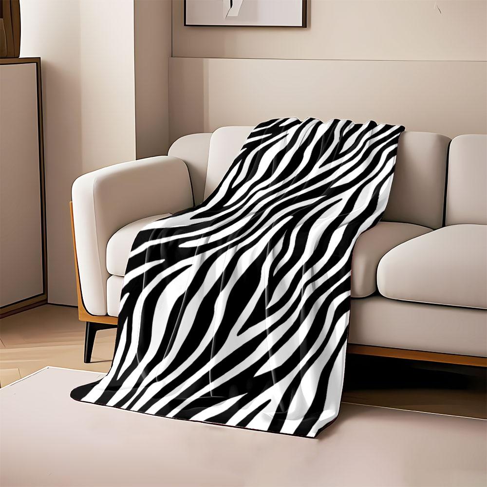 Black and white zebra-like stripes, flowing in irregular wavy patterns. for all seasons blanket lunch break throw gift 80cm x 120cm