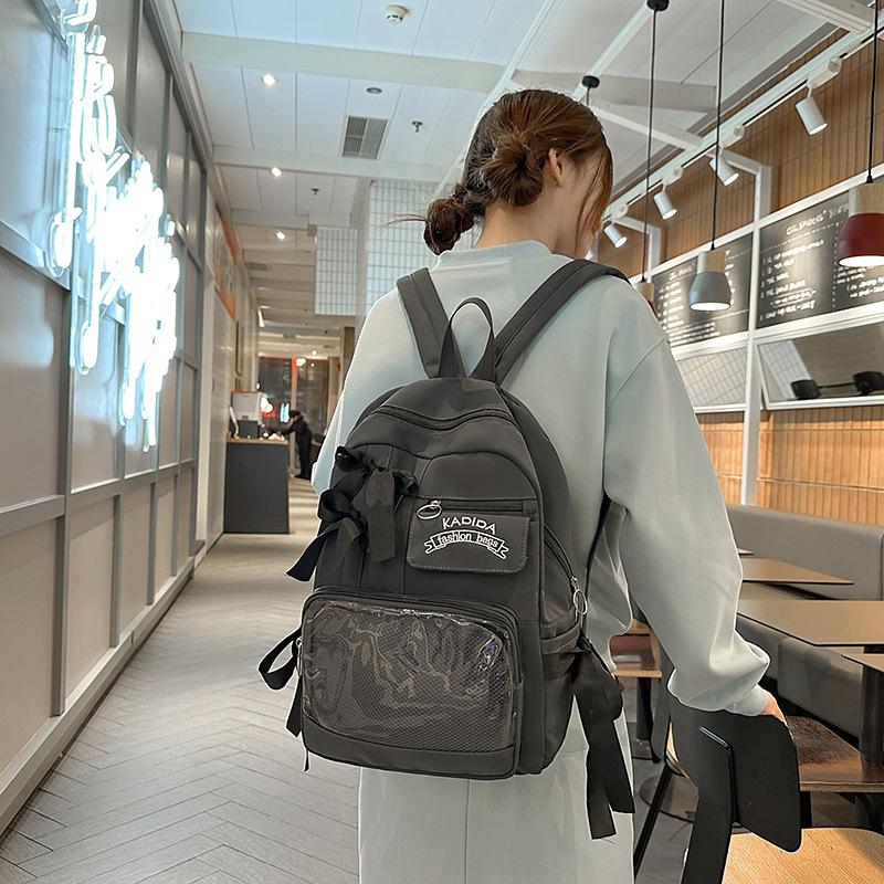 Bow schoolbag female corduroy junior high school students primary school students Internet celebrity backpack large capacity niche backpack