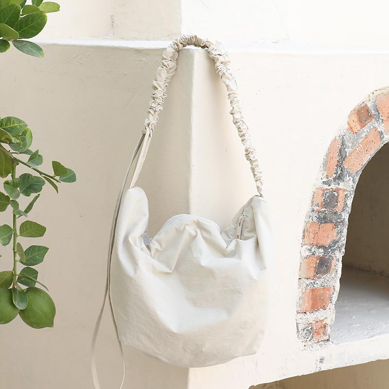 IELGY Japanese Casual Literary Canvas Bag, Fashionable Drawstring Shoulder Pleated Nylon Messenger Bag