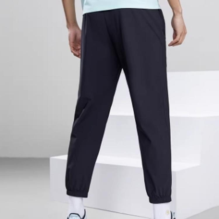 Anta Solid Color Ice Silk Sports Cuffed Zipper Pocket Casual Pants Men bottoms Black 152227329-1