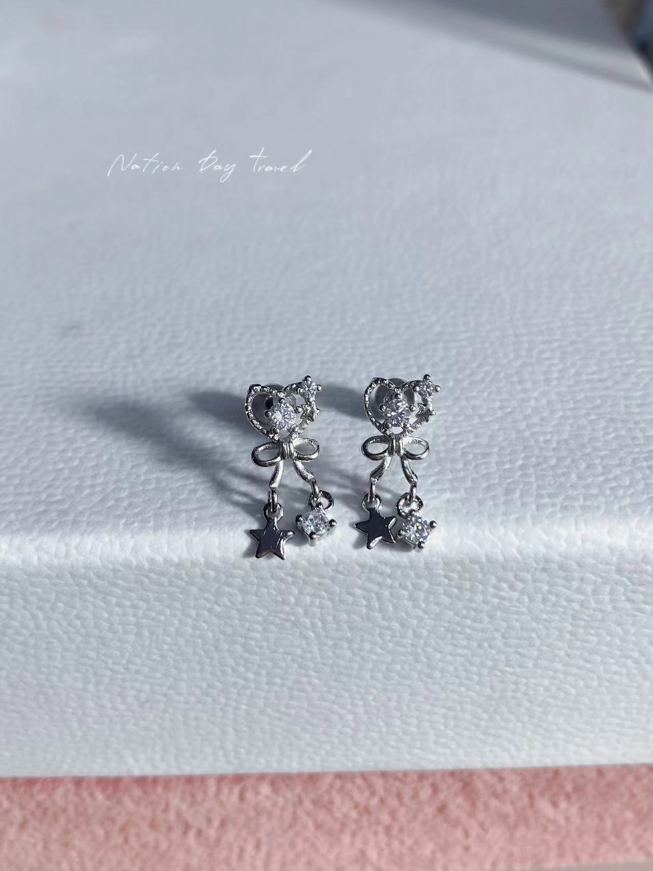 

Bow zircon fringed earbone studs female sweet cool star stud earrings design sense niche