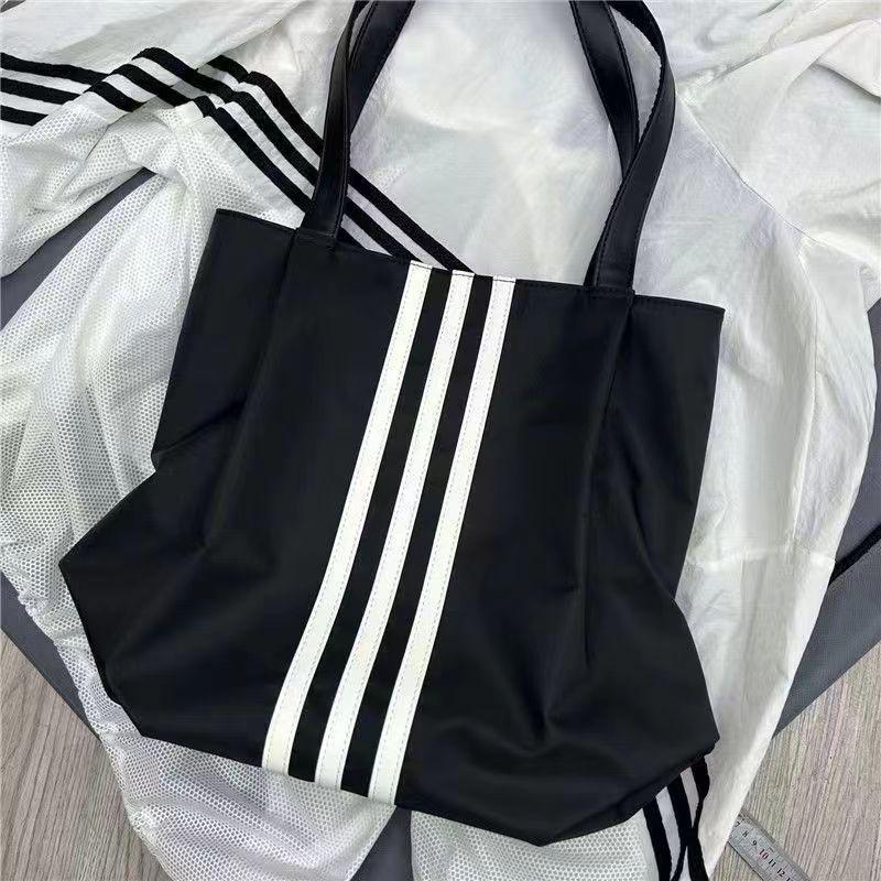 

Большая женская холщовая сумка-тоут на плечо Осень/Зима - Ленивый стиль, Мода 2025 Black Elegant Bag