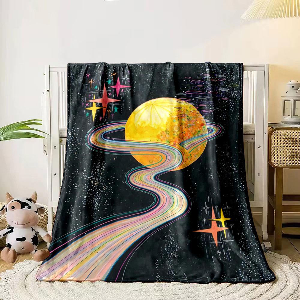 

A vibrant rainbow path encircles a glowing planet with starry accents. for all seasons blanket lunch break throw gift 80cm x 120cm