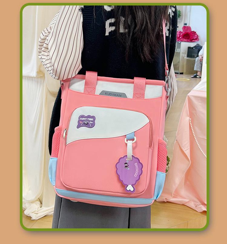 Cool Dyman Student Backpack - Versatile, Large-Capacity, Hand-Carry, Double/Single Shoulder, Crossbody Bag for Campus & Tutoring.