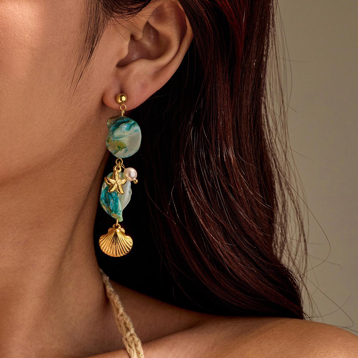 Ethnic Style 2025 Women s Simple Exaggerated Fashion Style Vacation Style Irregular Scallop Starfish Pendant Blue Stone Earrings