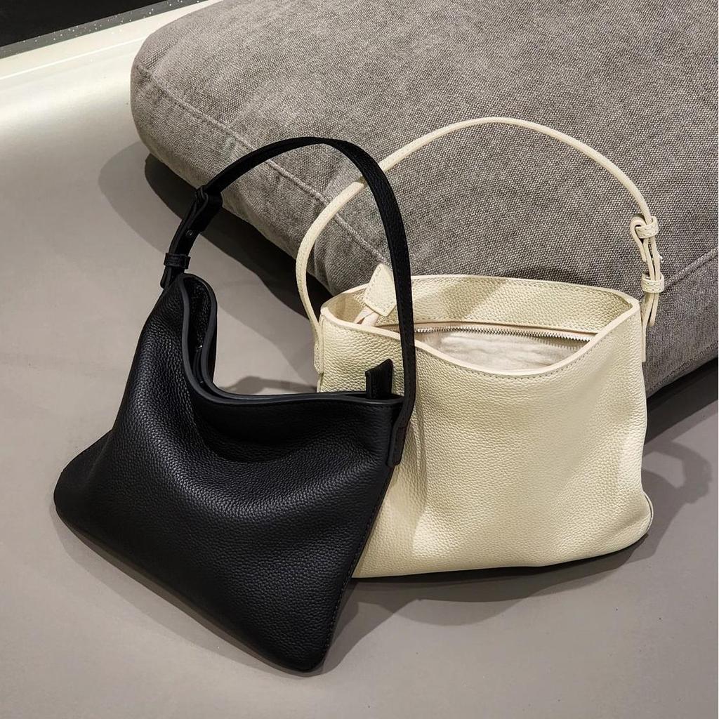 Borsa a secchiello casual in pelle bovina di primo strato, borsa tote minimalista di alta gamma, borsa in pelle versatile leggera e alla moda a spalla singola o diagonale