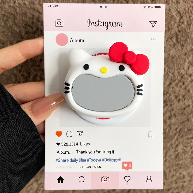 Creative Silicone Airbag Magnetic Phone Holder - Cute Cartoon KT Design with Retractable Folding Mirror