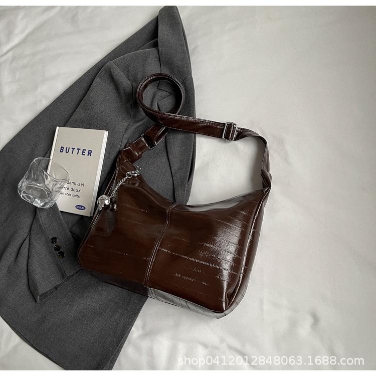 

Модная универсальная сумка-тоут большой вместимости 2025 новая повседневная взрывная сумка-мессенджер популярная в этом году сумка через плечо для поездок на работу темно-коричневого