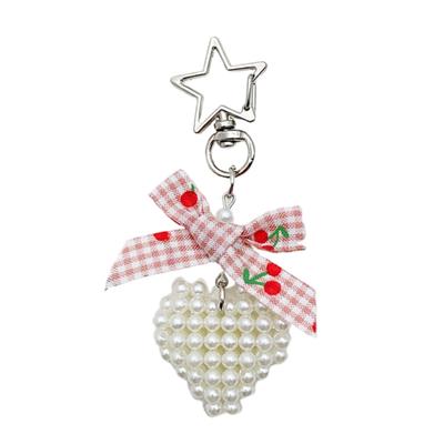 Elegant Bowknot Keychain Pendant with Heart Charm and Pearls Accents Accessory for Handbags and Phones Decoration