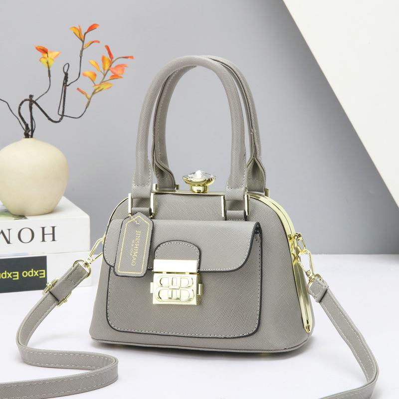 2026 New French Clip Mouth Gold Bag Women's Retro Handbag