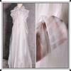 This white glittering hazy mesh fabric can be used for wedding dresses evening gowns and designer clothing fabrics