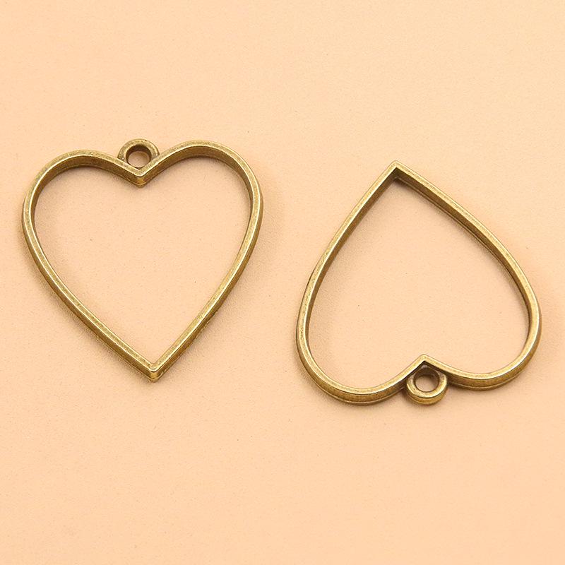 17 Ancient Green DIY Alloy Jewelry Pendants: Moon, Round, Heart with Drip Glue and Hollow Borders.