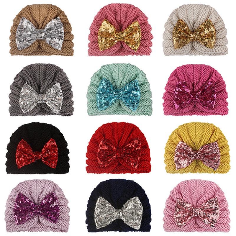 New baby sequined knotted thermal hat in autumn and winter, cute baby bow knitted hat, children's hat