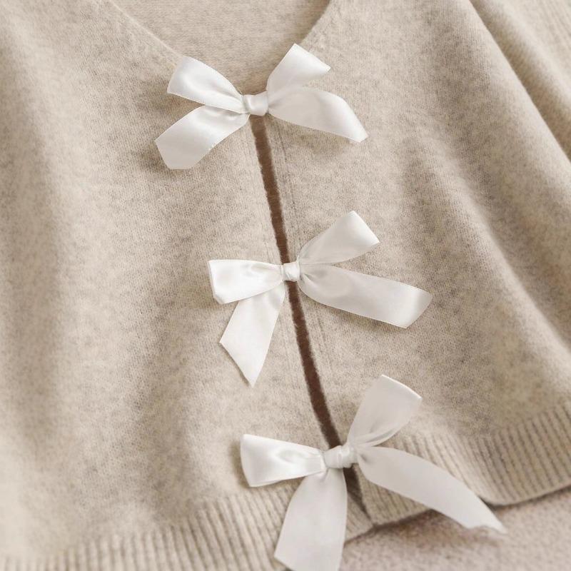 Design bow knitted cardigan autumn and winter new loose versatile lazy style knitted sweater