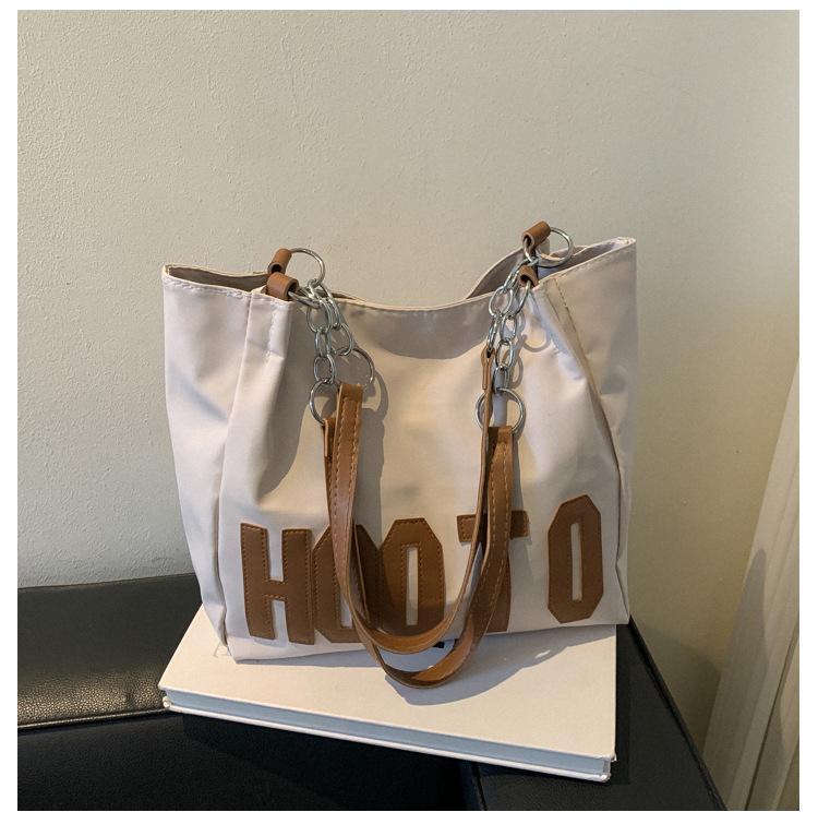 

Жіноча сумка великої місткості Нова проста сумка під пахвами з контрастними літерами Сумка через плече для поїздок студентів коледжу хакі