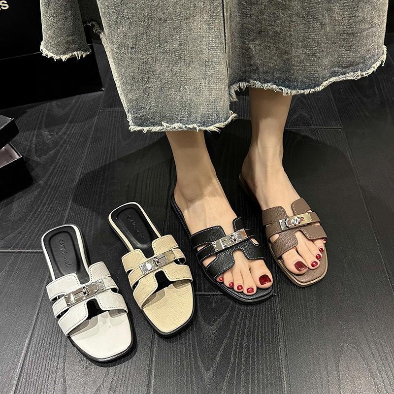 2025 summer new wear drag net red fashion versatile shoes one word explosion beach with cool flat bottom slippers women