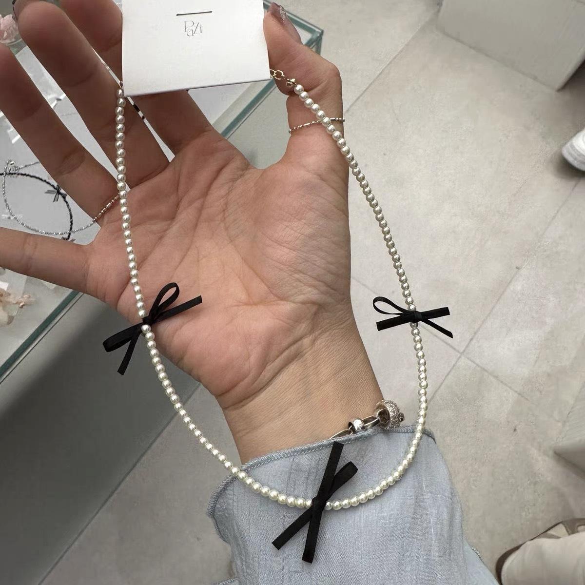 

In Superior Sense Sweet Ribbon Bow String Pearl Necklace Femininity Titanium Steel Non-Fading Clavicle Chain