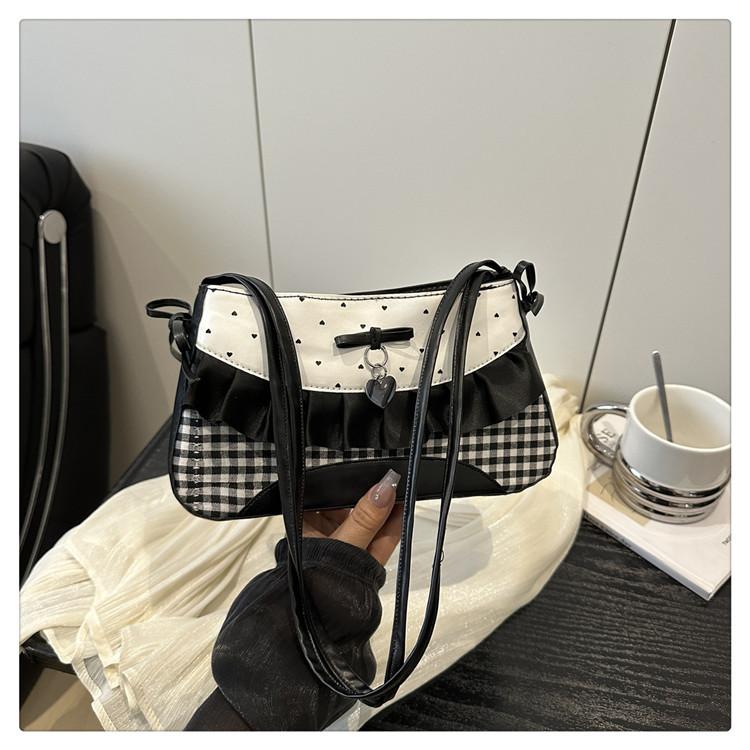 

Японская милая сумка-багет с бантом под мышкой женская 2025 новая нишевая высококлассная девичья портативная сумка через плечо чёрный