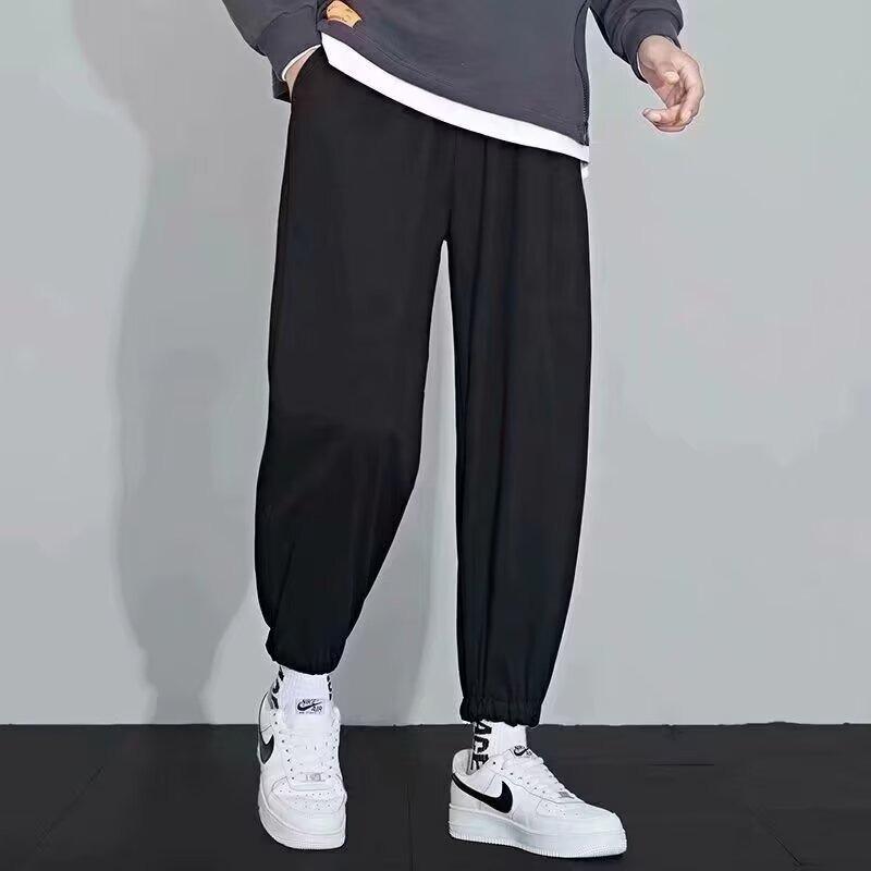 Solid color pants men's autumn new spring and autumn tooling casual trousers loose versatile tied nine-point trousers