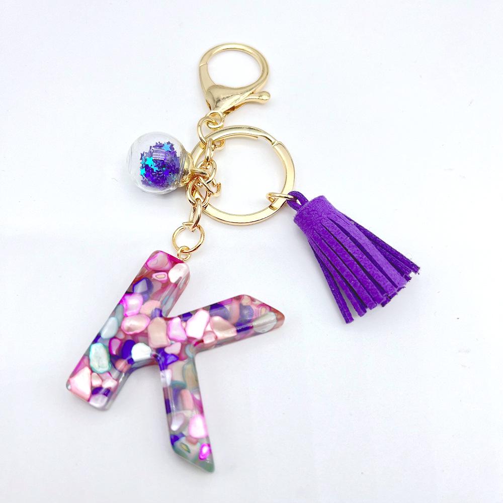 Breloc inițial englezesc de vânzare la cald european și american cu accesoriu cu ciucuri violet