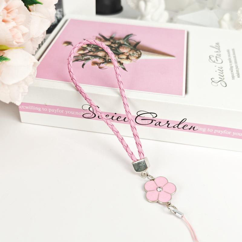 Creative Camellia Clover Lucky Phone Lanyard: Four-Leaf Clover Flower Woven PU Phone Chain Pendant.
