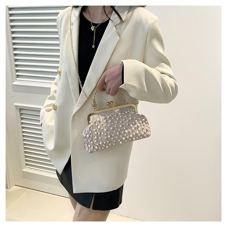 Dámská elegantní crossbody kabelka s kamínky na rameno, skořápka, jaro 2025