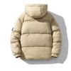 Nuova versione invernale da uomo coreana del cappotto imbottito in cotone con cappuccio spesso di tendenza