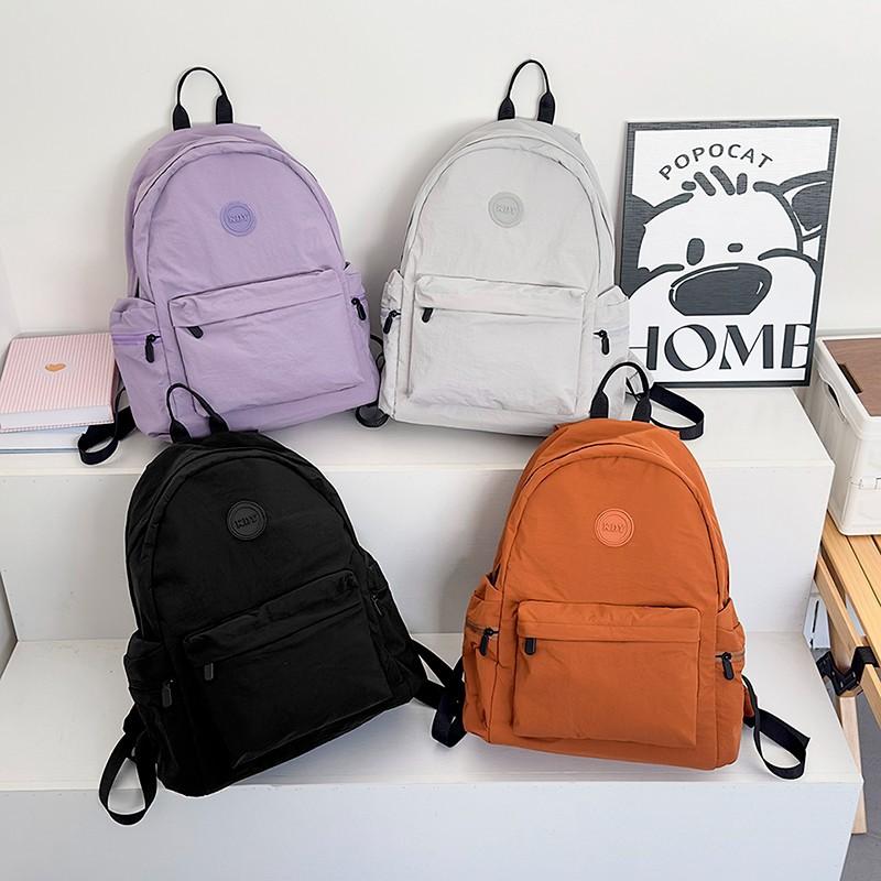 New Schoolbag Fashionable Commuter Versatile Backpack Japanese Simple Solid Color Junior High School Students College Style Backpack