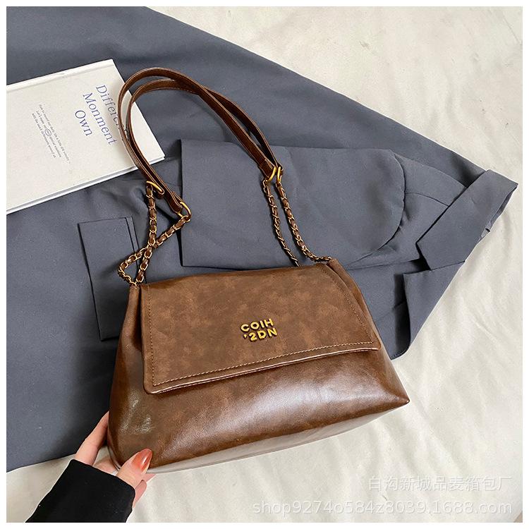 

Premium texture retro bag women s 2025 new autumn and winter texture shoulder bag large capacity commuter chain tote bag коричневый