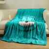 A single eye on a smooth teal background with curved smile-like contours. for all seasons blanket lunch break throw gift