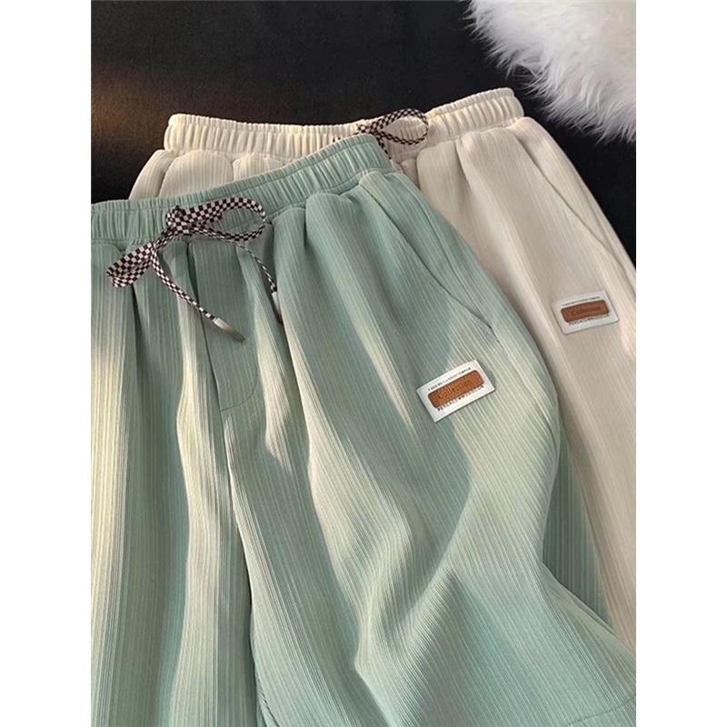 Letní tenké ledové hedvábné ležérní šortky Pánské basketbalové pětibodové rozehrávačské kalhoty Americké volné univerzální kalhoty