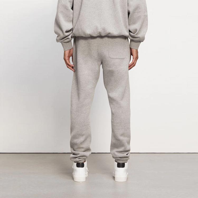 Fear of God Essentials Fleece Joggebukser Melert Havregryn Reflekterende Logotrykk Løse Amerikansk Tungvektsstrikk Joggere 0130250500117260